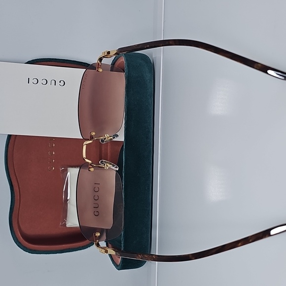 GUCCI UNISEX GG1221S 004 GUCCI RIMLESS GG LOGO ON LENS SUNGLASSES - Picture 4 of 13